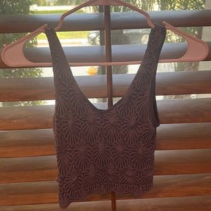 A dark blue top with a pretty texture design